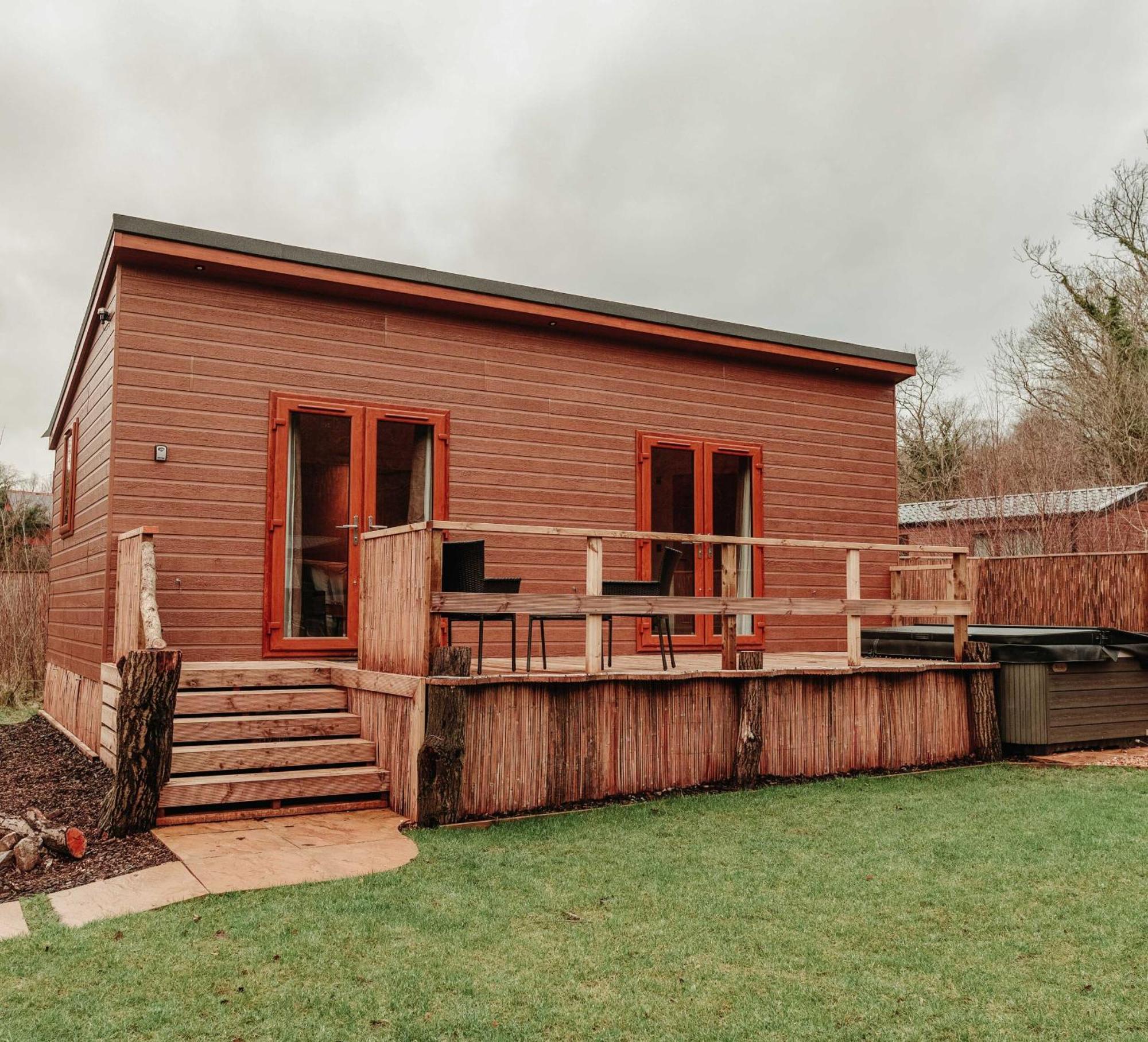 Herons Lake Retreat Hot Tub Lodges Caerwys Exterior photo